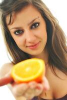 woman isolated on white hold orange photo