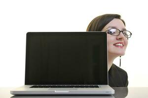 business woman working on laptop isolated on white photo