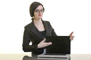 business woman working on laptop isolated on white photo