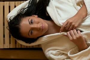 Young woman take a steam bath photo