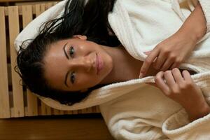 Young woman take a steam bath photo