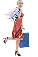 happy young adult women  shopping with colored bags photo