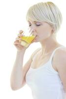 Young woman squeeze orange juice photo