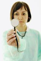 happy nurse with stethoscope  isolated on white photo