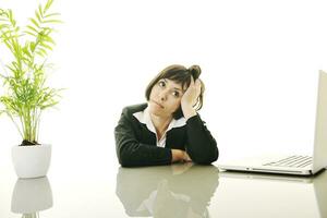 business woman working on laptop photo