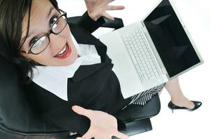 business woman with laptop isolated on white photo