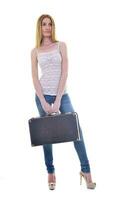 blonde girl with travel bag photo
