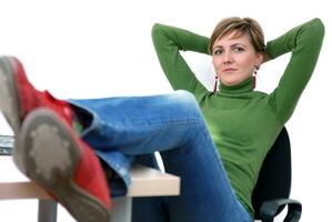 casual girl relaxing at the office photo