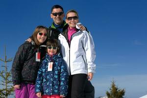 portrait of happy young family at winter photo