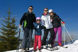 portrait of happy young family at winter photo