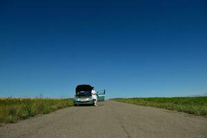 woman with broken car photo