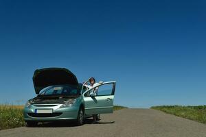 woman with broken car photo