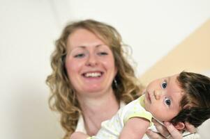 young mother and baby relaxing photo