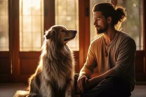 un hombre con perro se sienta abajo y hace ojo contacto con el cámara mientras meditando en su hogar foto