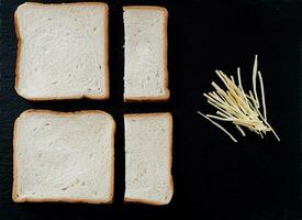 Slice of white bread and cheese photo