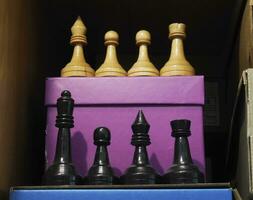 chess set on colorful boxes photo