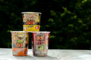 Nonthaburi, Thailand - September 15, 2023 Mama Set is noodles cup with Tom Yum Shrimp and Minced Pork Flavor. Mama is a popular brand in Thailand. Copy space photo