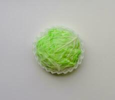 fresh cabbage wrap by foam on white background photo