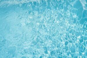 Looking Down on a Crystal Clear Pool as Wind Causes a Ripple Effect photo