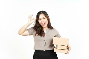 Holding Package Box or Cardboard Box Of Beautiful Asian Woman Isolated On White Background photo