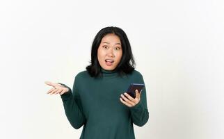 Holding Smartphone confused gesture Of Beautiful Asian Woman Isolated On White Background photo