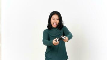 Holding Game Controller and Playing, Yes and Happy face gesture Of Beautiful Asian Woman Isolated On White Background photo