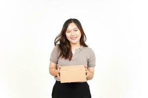 Holding Package Box or Cardboard Box Of Beautiful Asian Woman Isolated On White Background photo