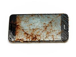 broken smartphone isolated on white background photo