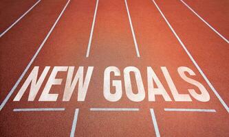 New goals. Letters on treadmill. concept of inspiration Contests and planning to set strategies to new goals for business success in new year. photo