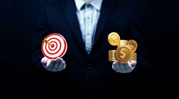 Goals and financial success. Two hands of businessman showing target and dollar coin. concept of Business strategic planning and goals for increasing profits. photo
