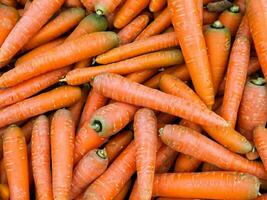 carrots background. fresh vegetables. organic food background photo