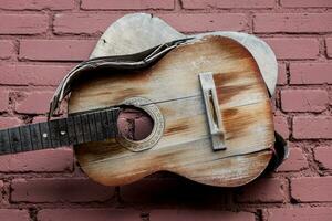 Old wooden guitar photo