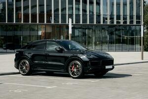 Minsk, Belarus, August  2023 - Luxury Porsche Cayenne photo