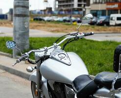 Minsk, Belarus, August  2023 - mirrors and tank of a classic Japanese honda motorcycle. photo