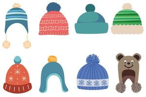 Set of winter or autumn hats flat design vector