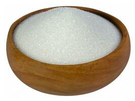 bowl of sugar isolated on white background photo