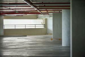 Underground parking garage in the mall, industrial building,mpty car parking,The soft sunlight in the morning. photo