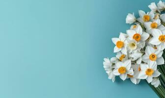 un narciso flores ramo de flores en un pastel azul antecedentes con vacío espacio de copia. de la madre día concepto. creado por generativo ai foto