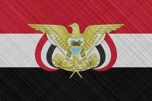 Flag and coat of arms of Republic of Yemen on a textured background. Concept collage. photo