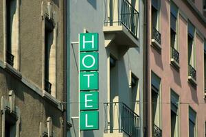 Hotel sign on building photo