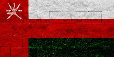 Flag of Sultanate of Oman on a textured background. Concept collage. photo