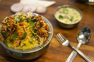 Dum chicken biriyani, close up image of Kerala-Thalassery biriyani which is mixed with masala photo