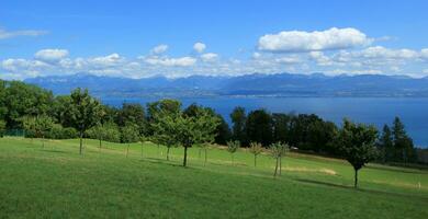 View of Geneva Lake and landscape of Vaud canton, Switzerland photo