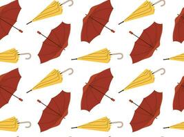 Red and yellow Umbrellas in various positions seamless pattern. Open and folded umbrellas. Vector illustration in flat style
