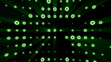 Abstract background of bright green glowing light bulbs from circles and dots of energy magic disco wall video