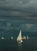 Sailing at sunset photo