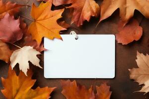 Mock-up of a white tag with autumn maple yellow leaves. AI Generated photo