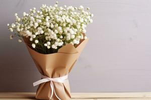 A bouquet of gypsophila flowers in a craft package on the table. AI generated photo