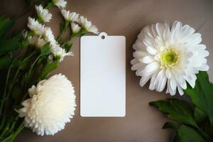 The layout of an empty tag lies with chrysanthemums and daisies on the table. AI Generated photo