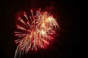 a large firework in the night sky photo